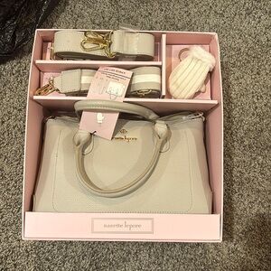 never been opened Nanette Leone purse, 2 adjustable, interchangeable straps